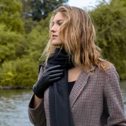 Women’s Touchscreen Three-Point Cashmere-Lined Leather Gloves -Fashion Accessories Shop woman wearing black cashmere lined leather gloves