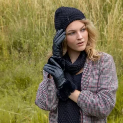 Women’s Touchscreen Three-Point Lined Leather Gloves With Faux Fur Cuffs -Fashion Accessories Shop woman wearing black leather gloves fauxfur cuff